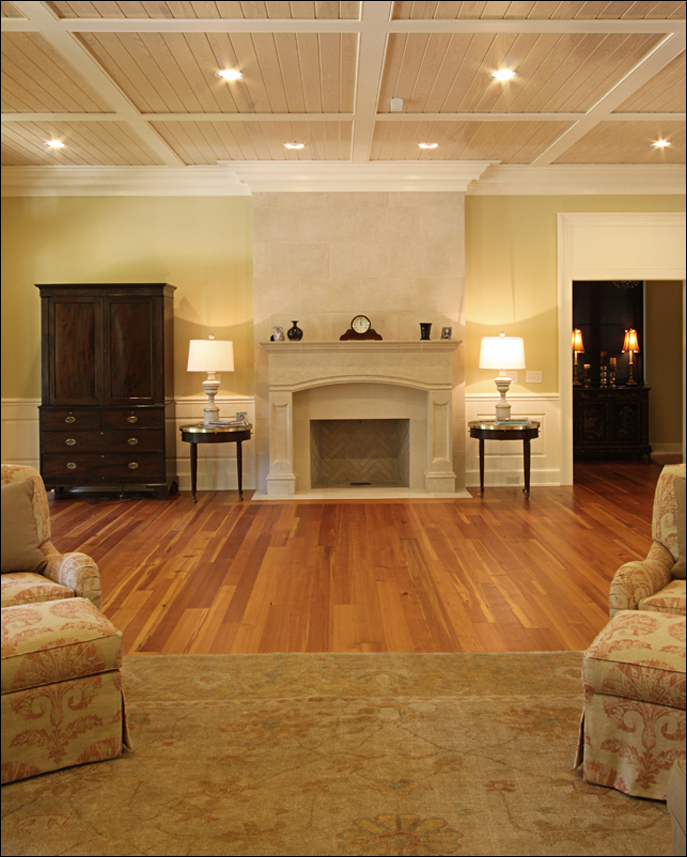 Antique Reclaimed Heart Pine Vertical Grain flooring and matching stair treads in a new Southern home.