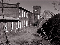 Abandoned 19th century factory will become Reclaimed Antique Heart Pine flooring - Southern Wood Floors